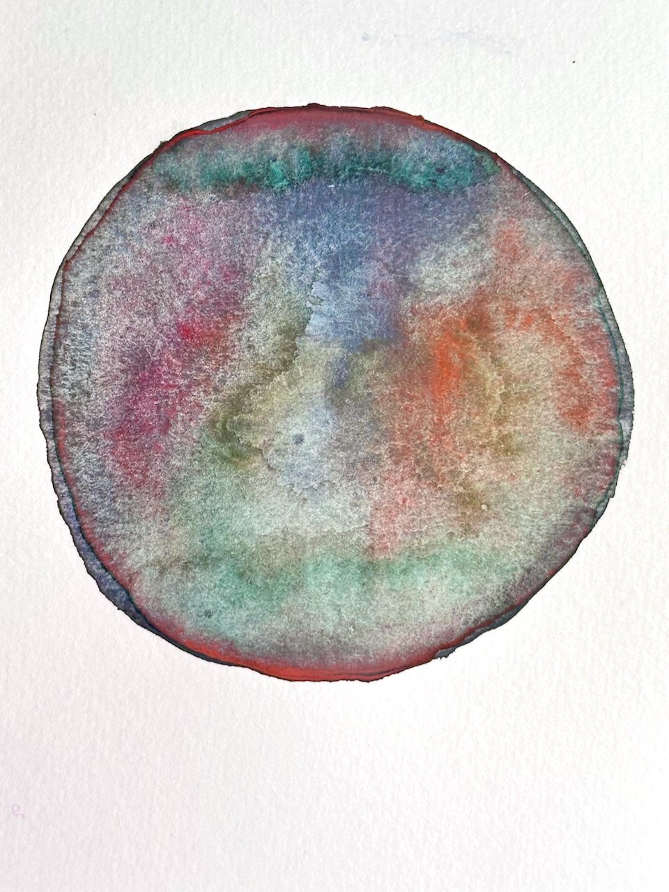 A circle of overlapping watercolours