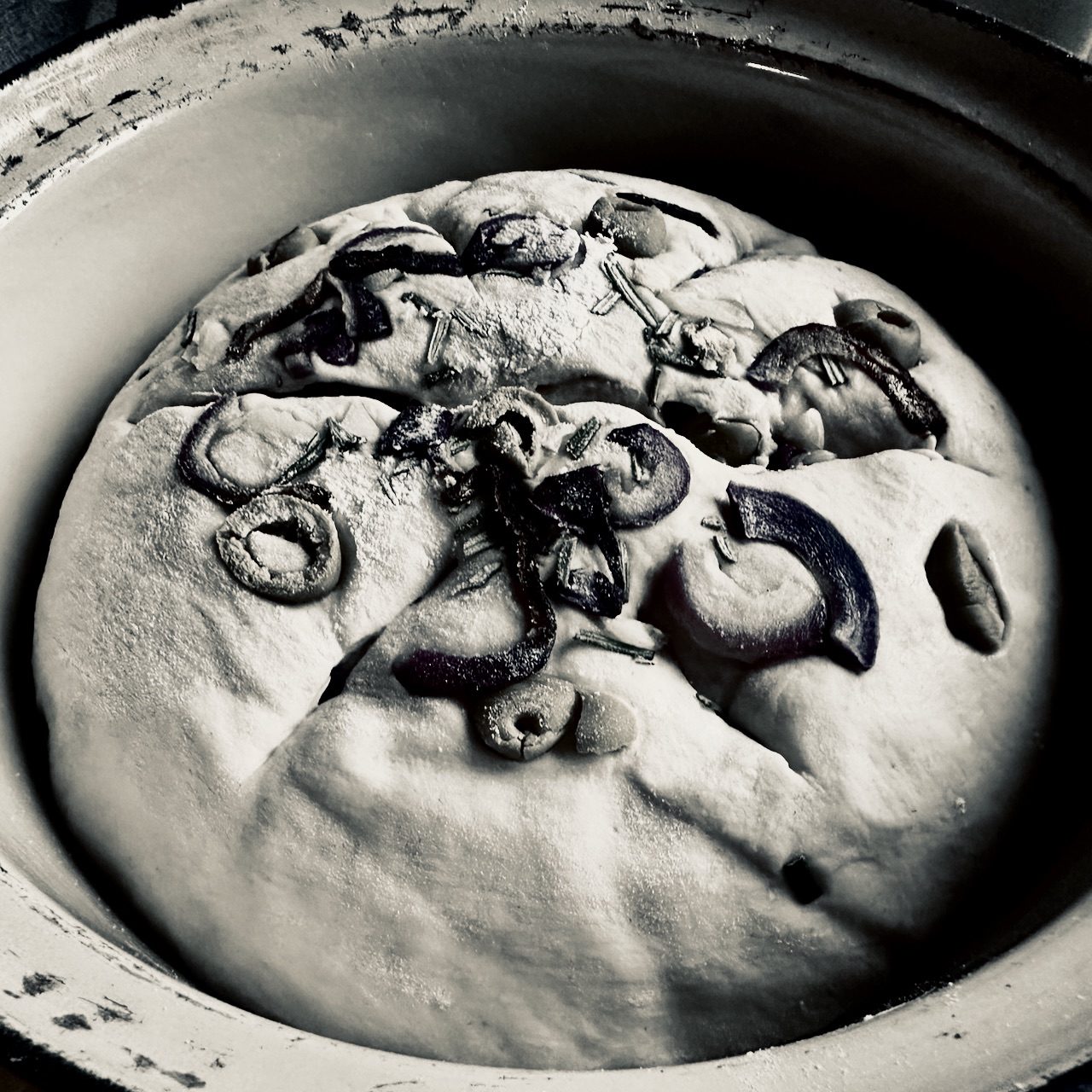 black and white photograph of bread before baking