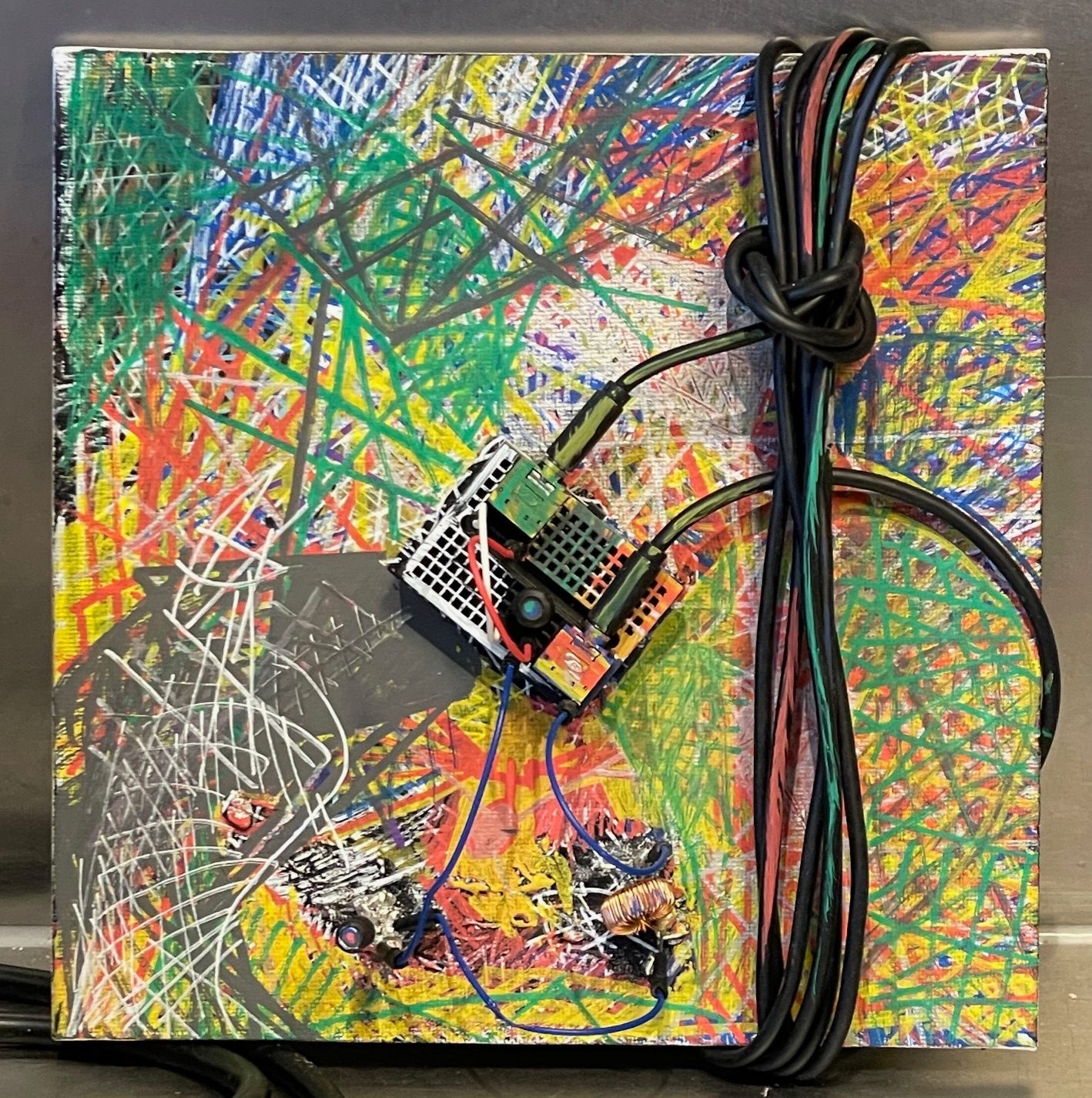 3d sculpture in a painting format, acrylic paint overlaying DIY electric components and audio cables tied in a knot