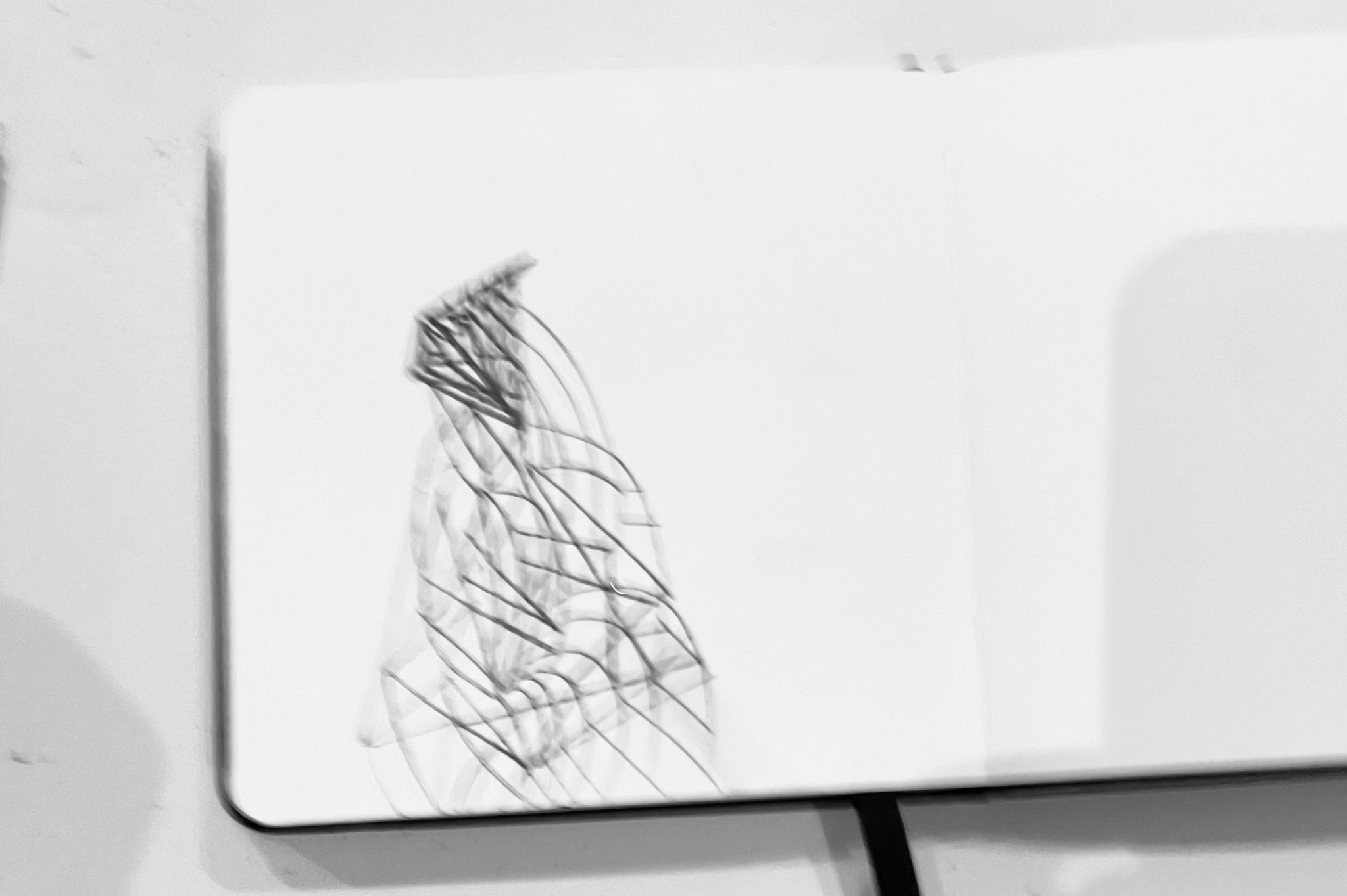 Blurred line drawing in a pocket book