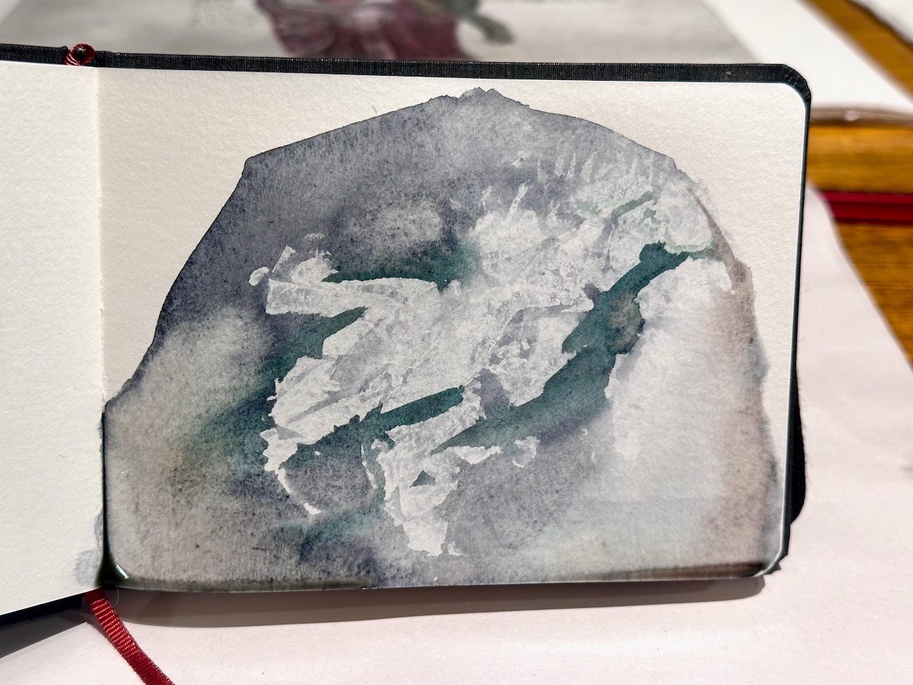 Abstract watercolour painting in sketchbook