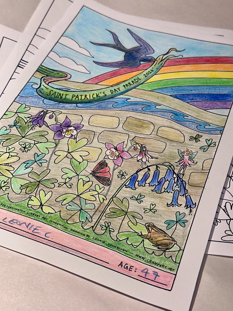 Hand drawn colouring page for St Patrick's Day Parade, coloured in.