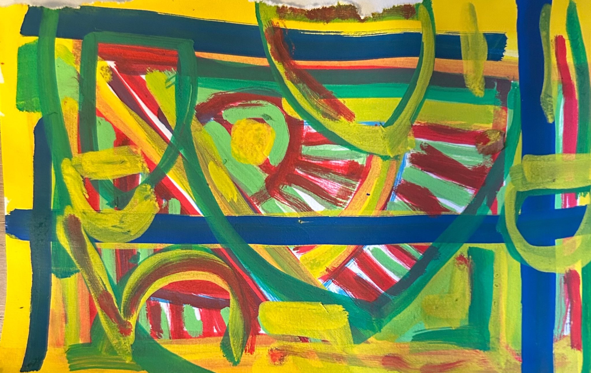 Bright primary colours with shield motif suggested in green .