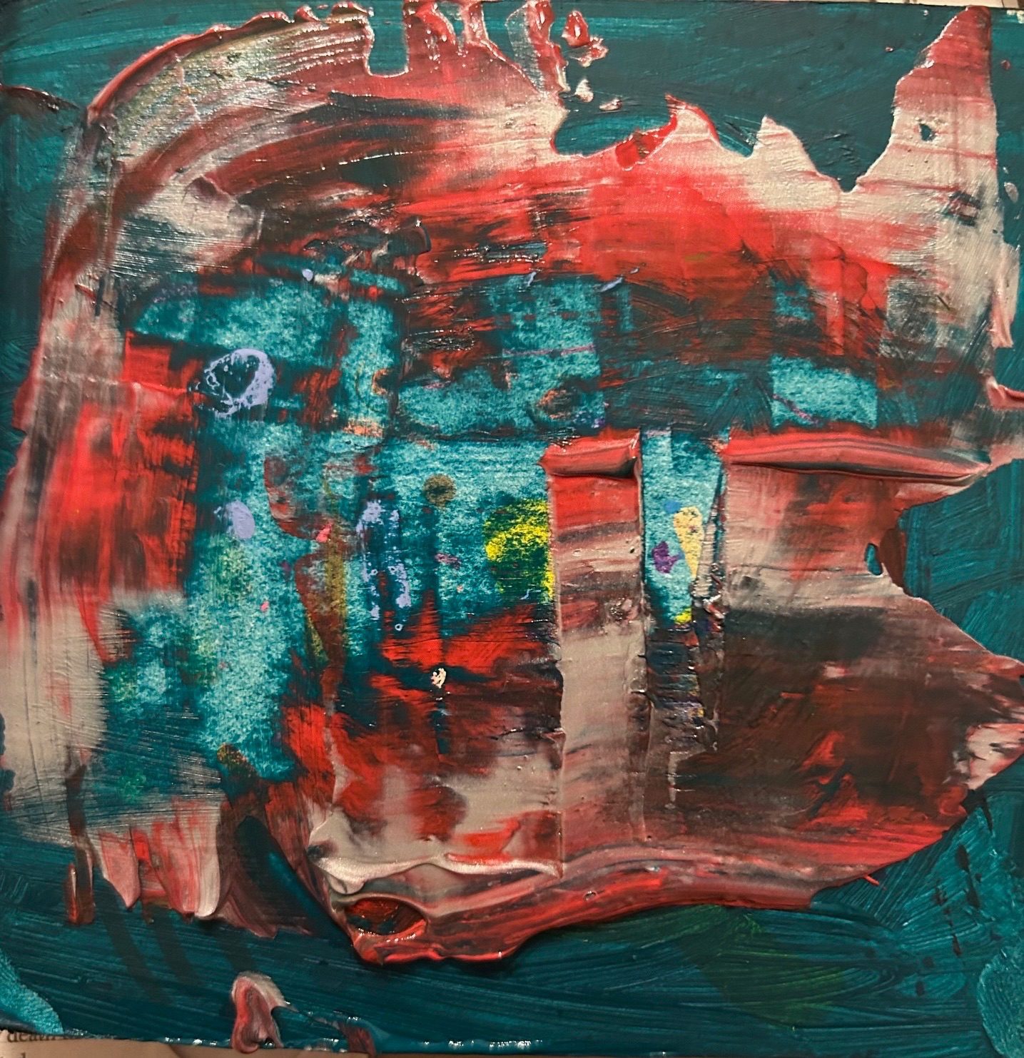 Silver and red spread on dark blue green background