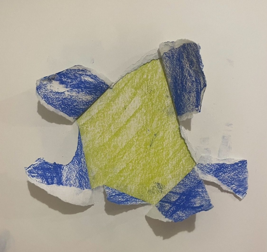 Ripped paper showing a green layer underneath