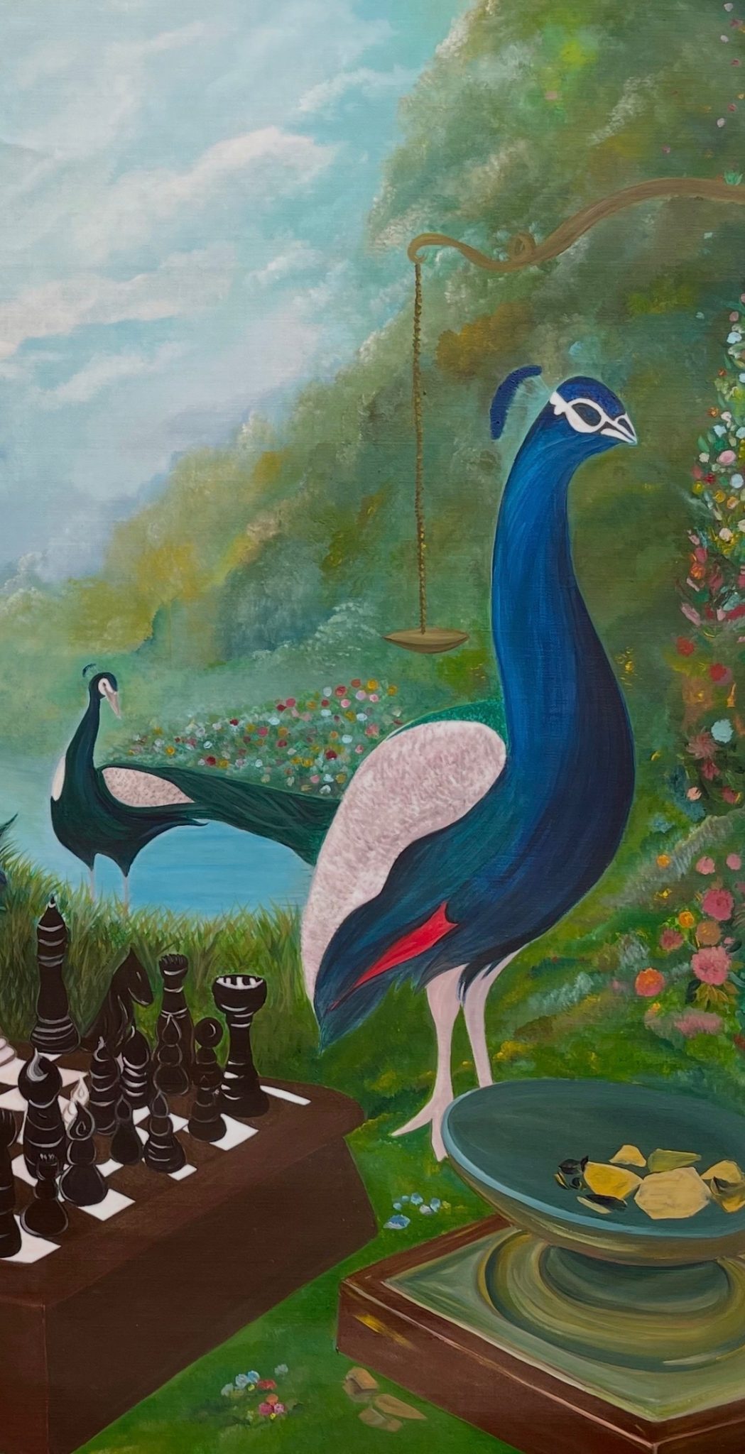 A surreal painting where two masked peacocks stand among flowers and water, accompanied by a chessboard of black pieces, a balance scale hanging from a branch, and a bowl of stones