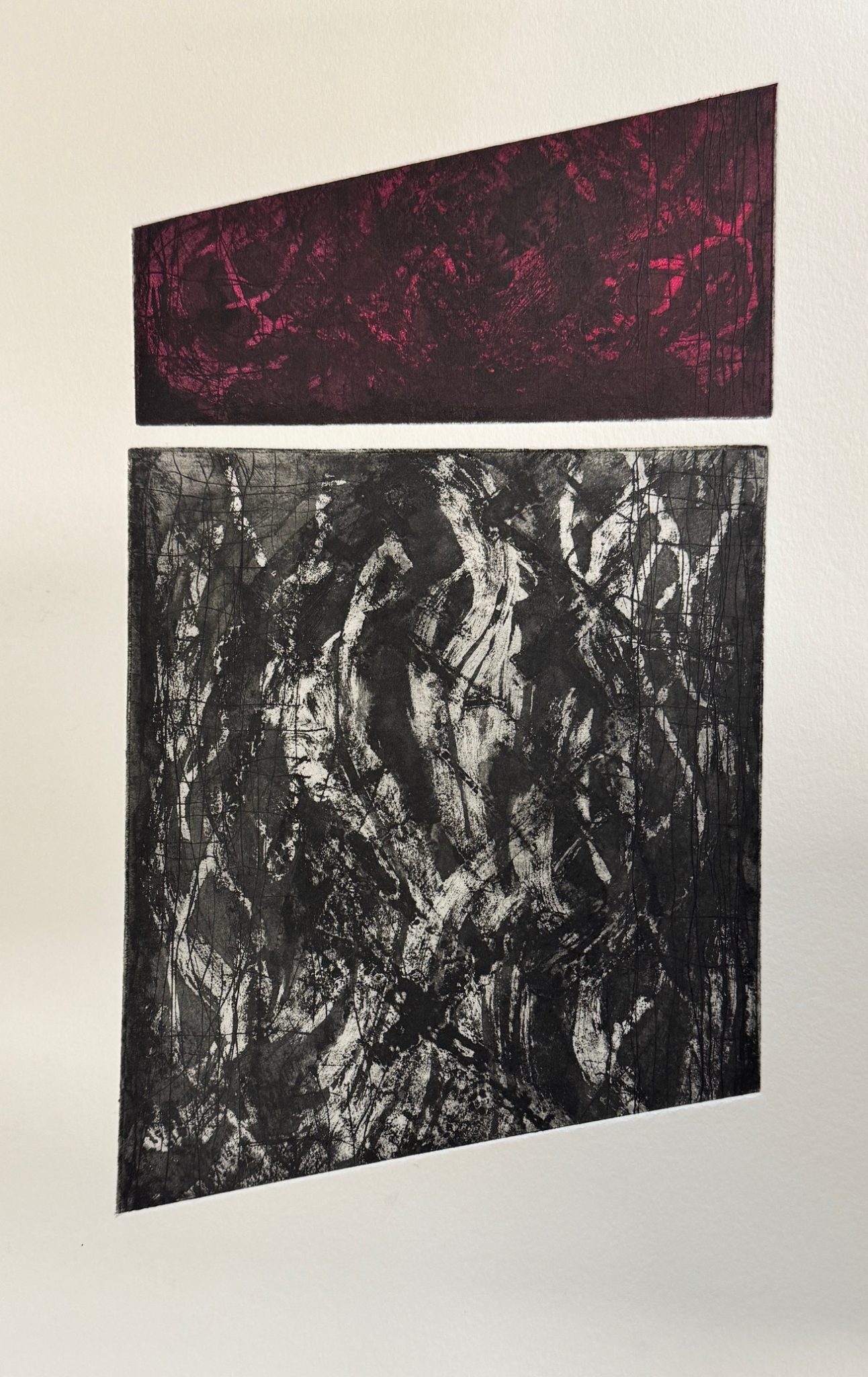 Abstract two plate etching of gentle swirls and fine grid lines printed in black with a red rollover on smaller top plate