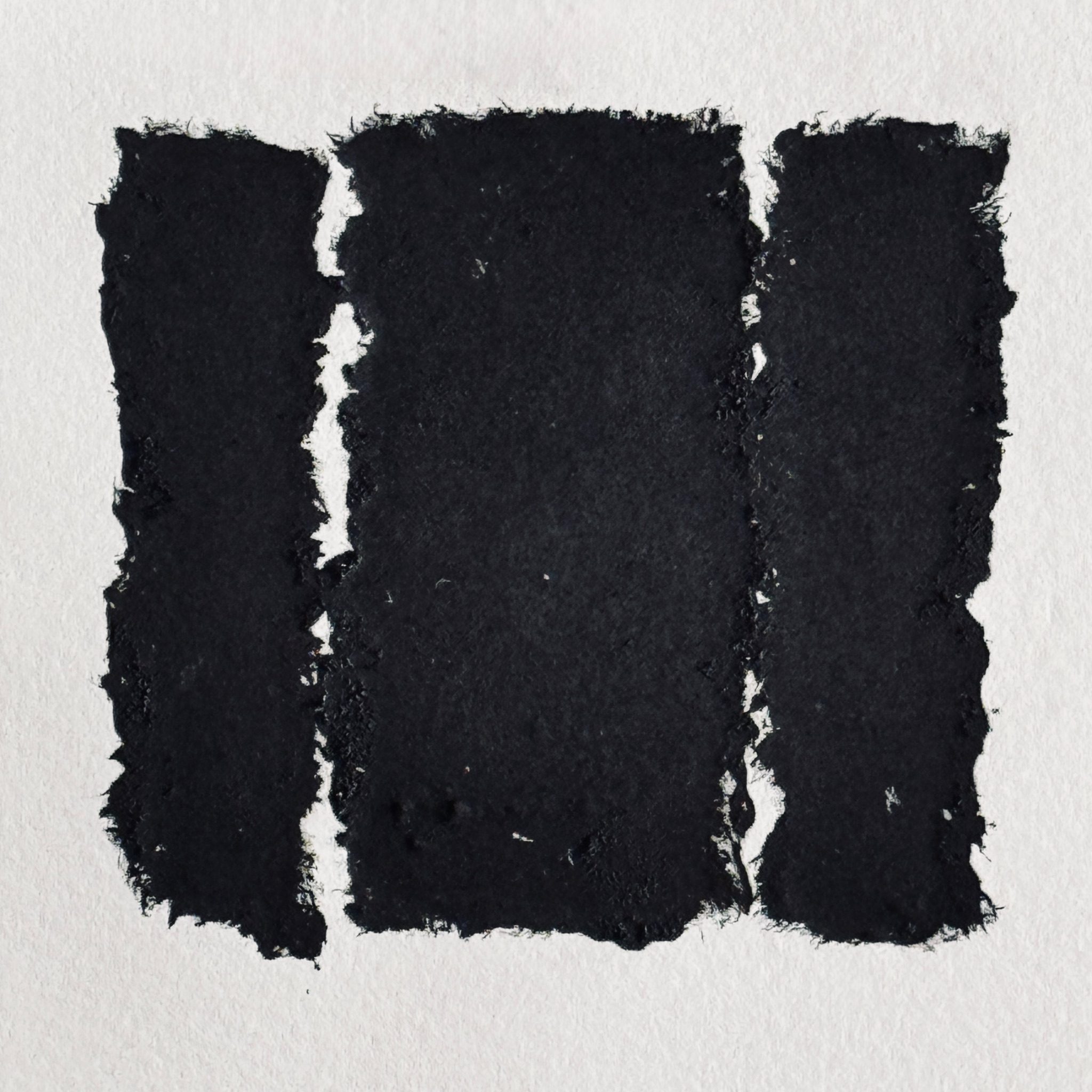 A relief print printed with black ink. A square plate with ragged edges has been torn vertically into 3unequal pieces.