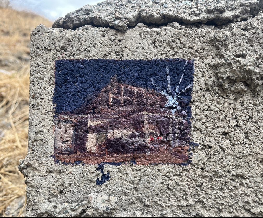 Picture of a Painting of a parking at night painted on concrete stairs outside