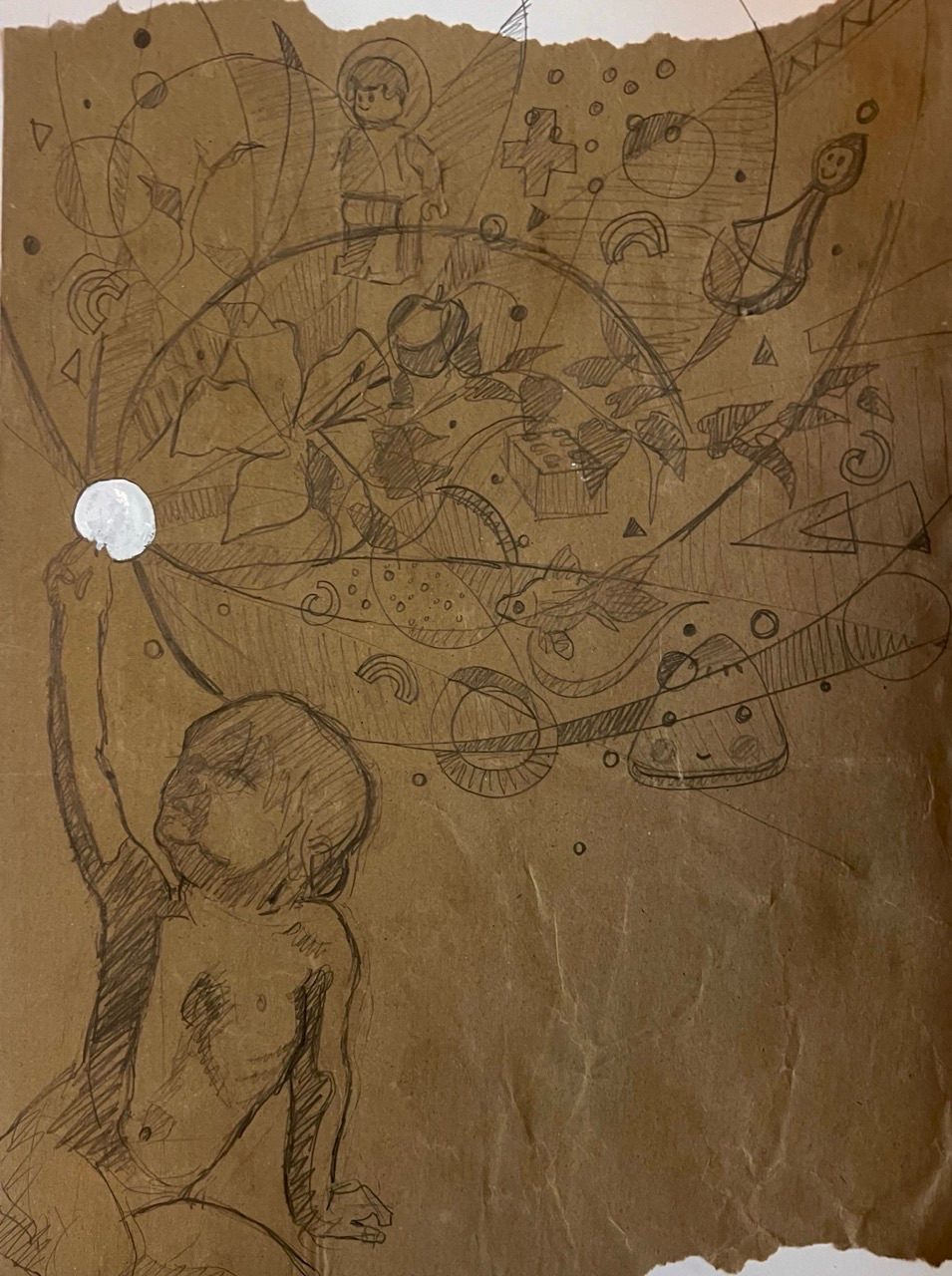 Boy holds a circle aloft. From it springs toys, shapes and swirls.