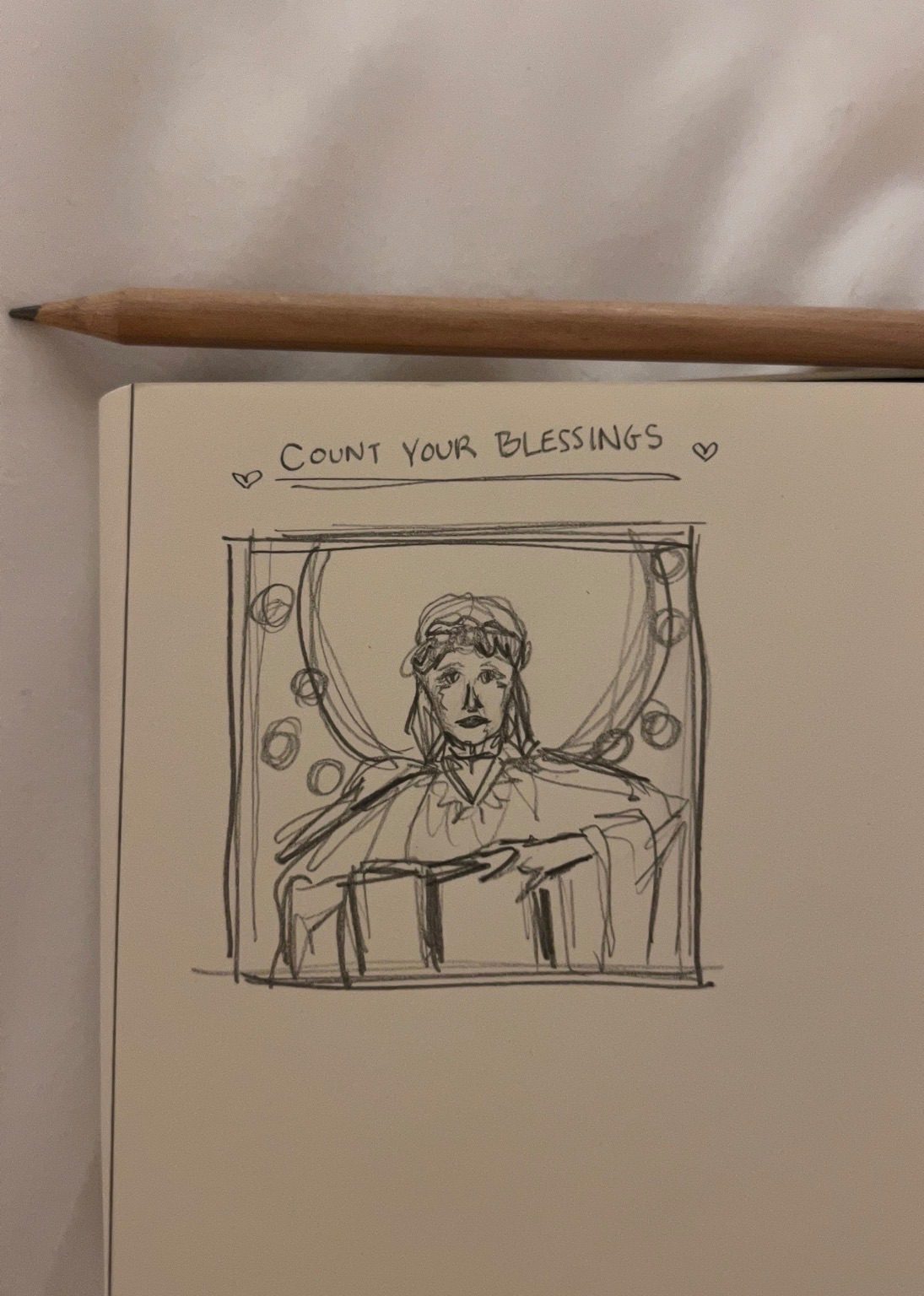 Sketch of a woman with a book