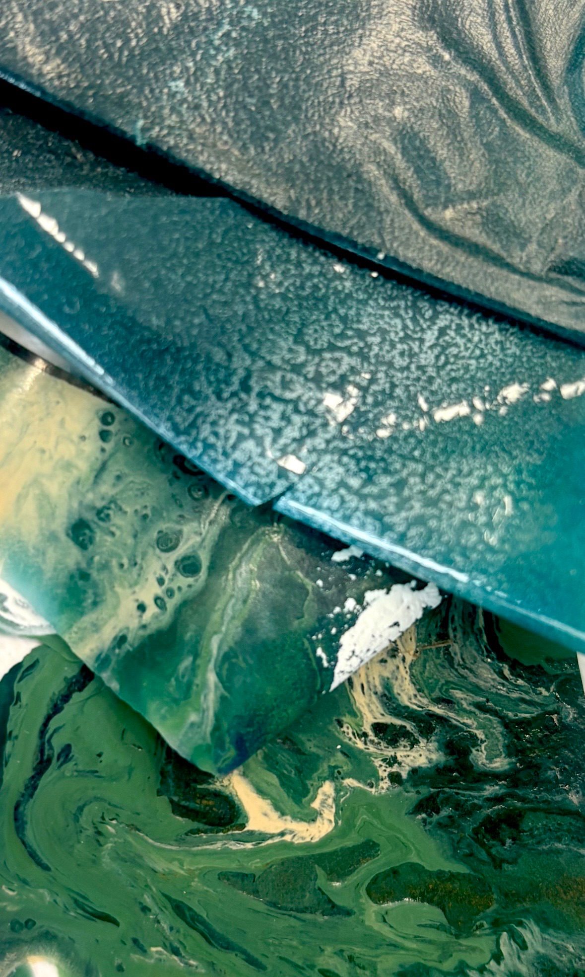 Scraps of pieces used to make a piece of art.