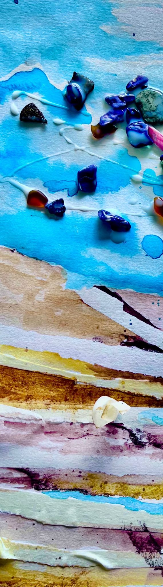 Mixed media depiction of rocks and water