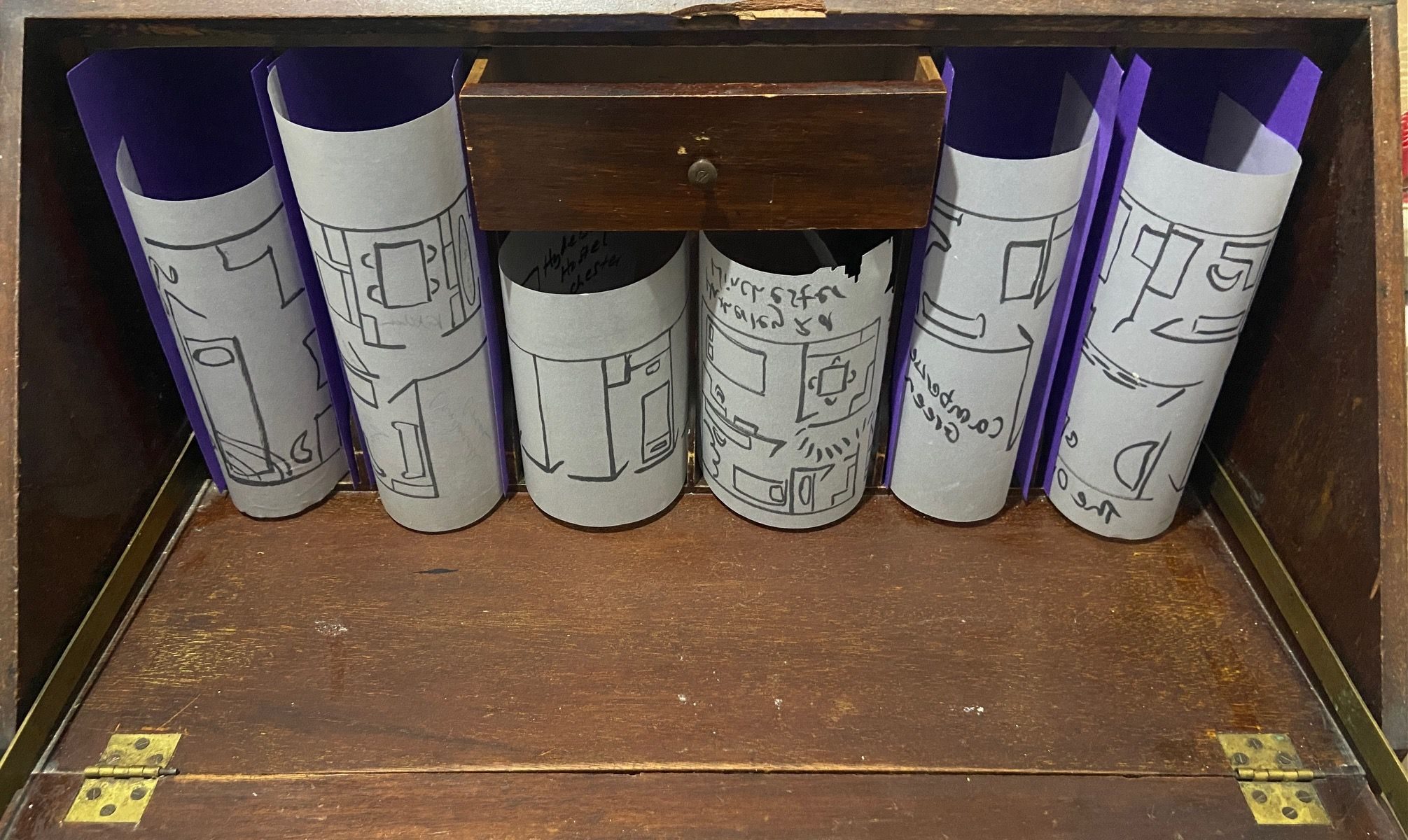 6 floorplans from different places I've lived in, tucked into the 'shelving' area of the bureau