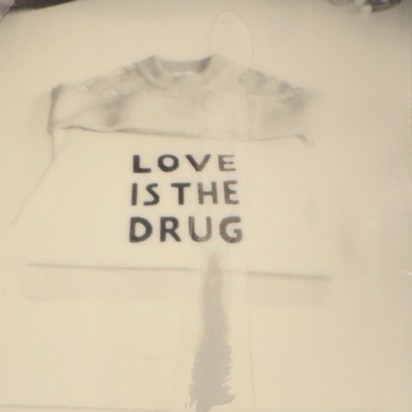 Black and white Polaroid image of two