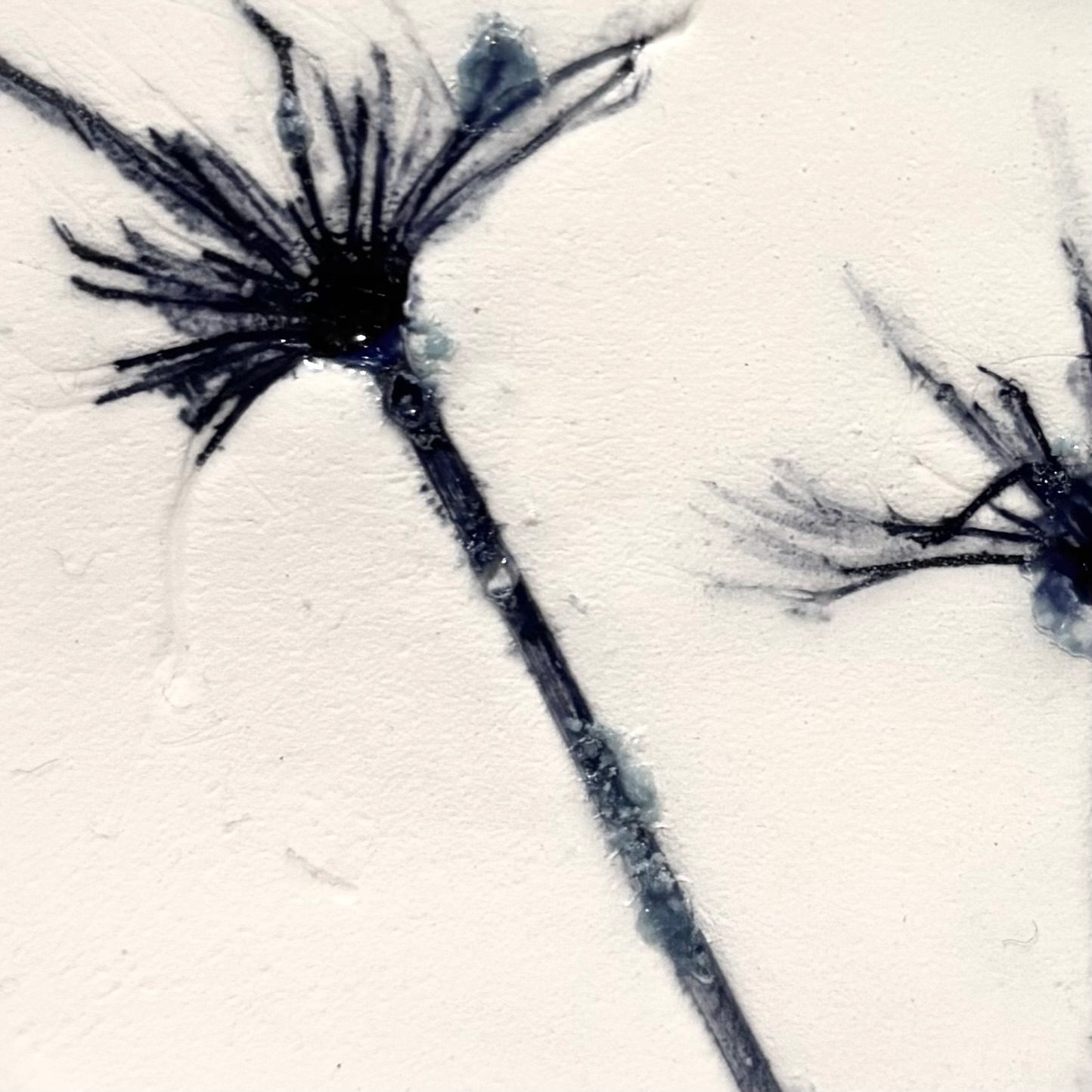 Bone china porcelain, ink and glaze, fired