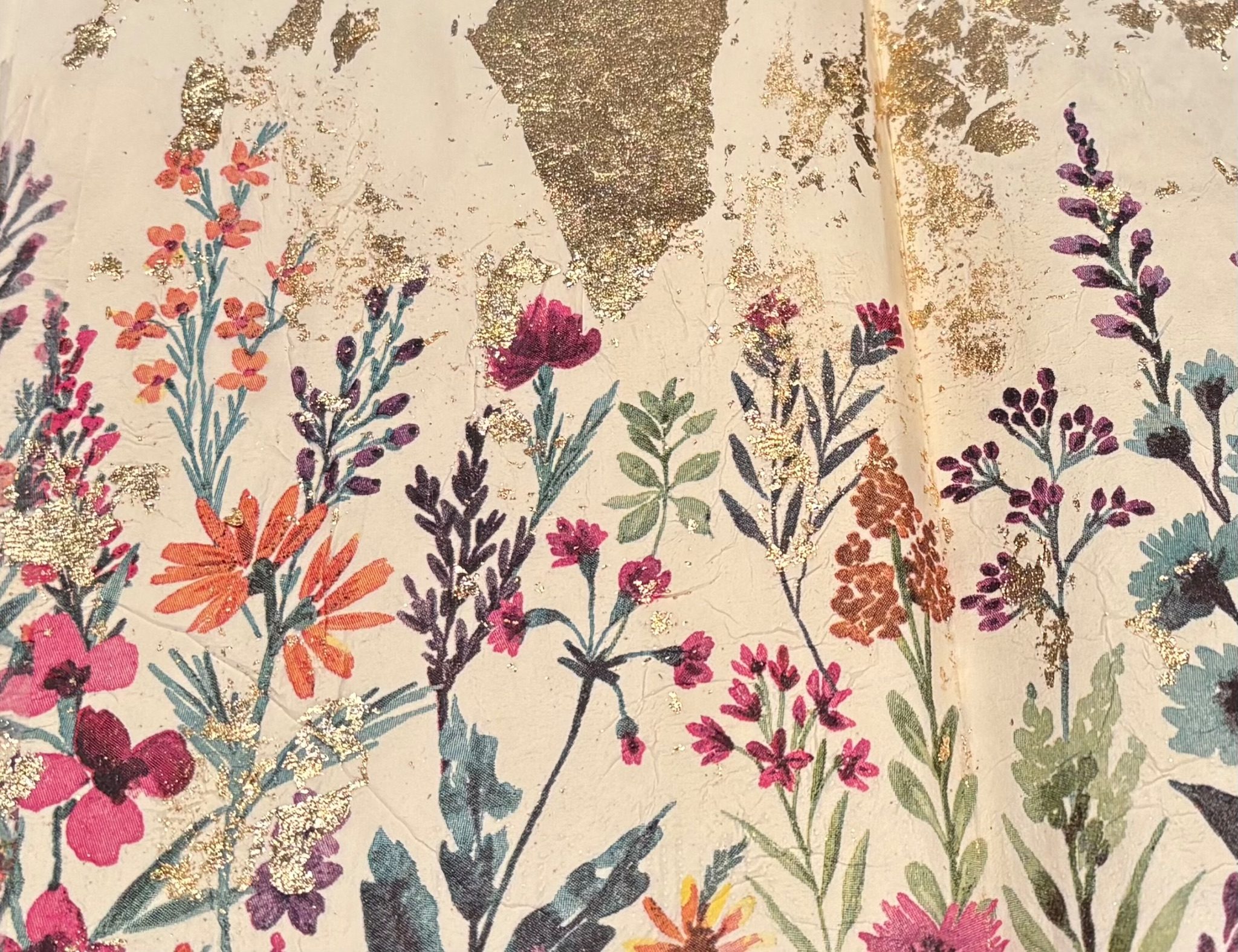 Image of colourful summer flowers with touches of gold leaf