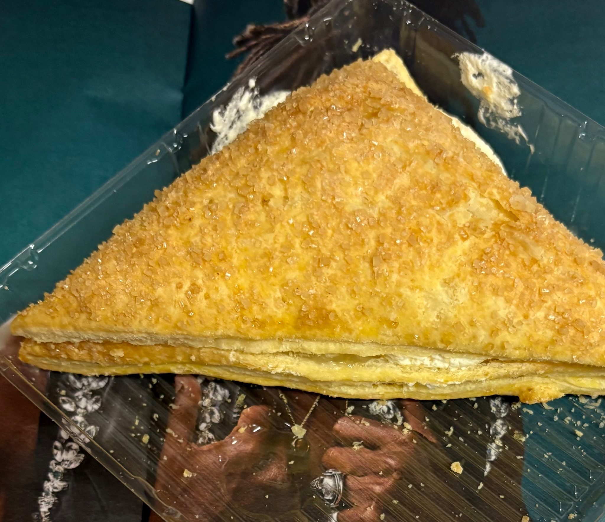 A triangular astry sat on top off a photograph on page 37