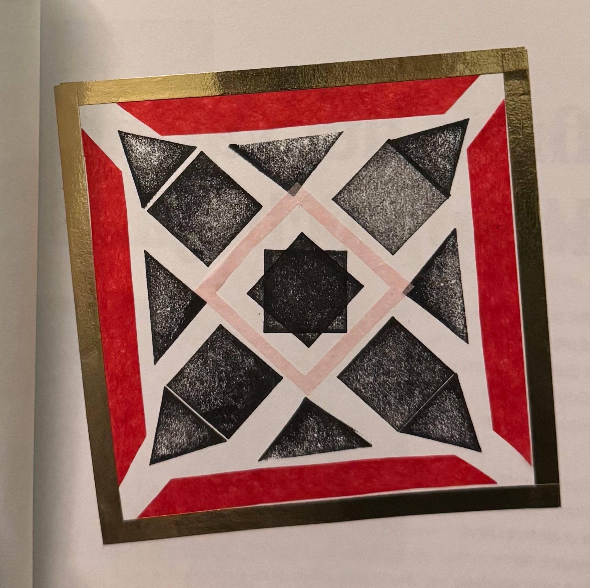 Black and white pattern with coloured tissue paper in a tape border.