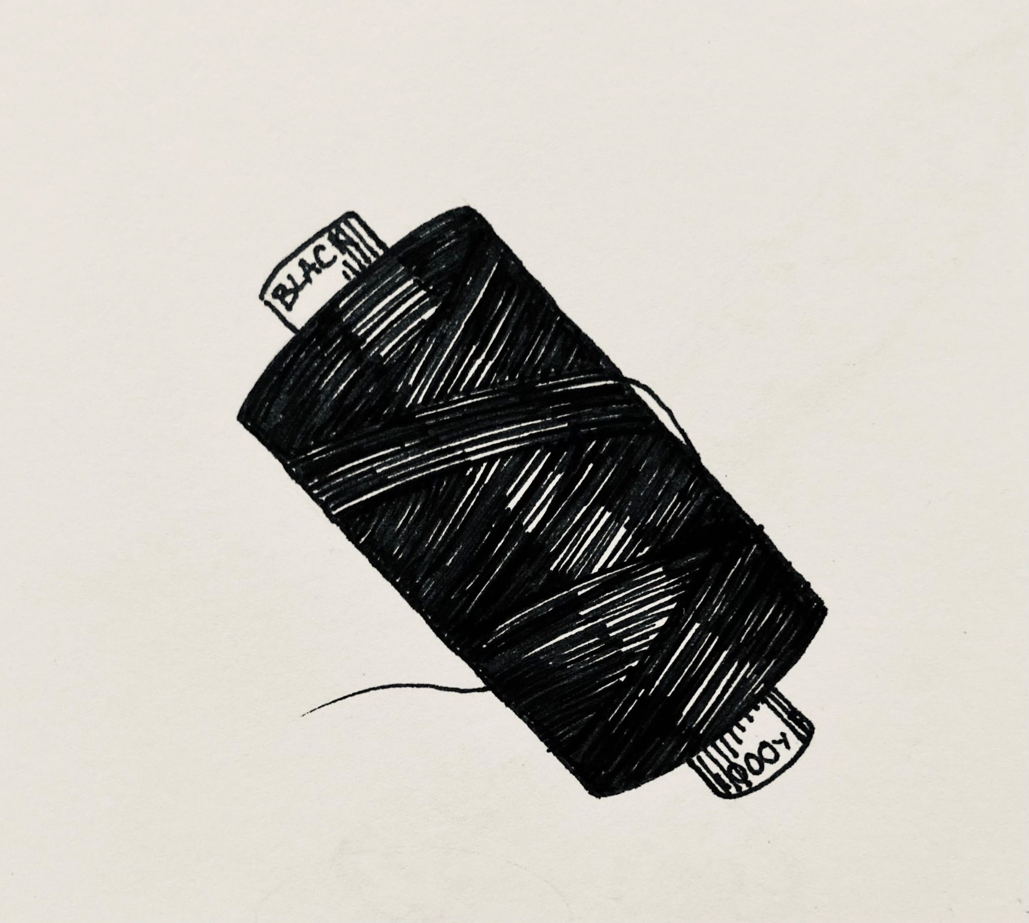 Fineliner a drawing of a spool of black sewing thread
