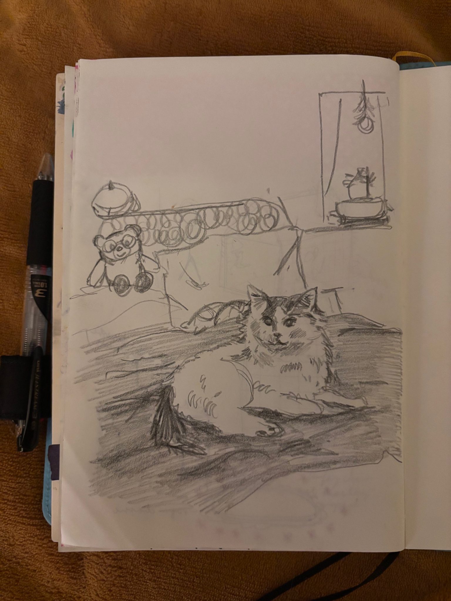 sketch of my cat lounging on my bed