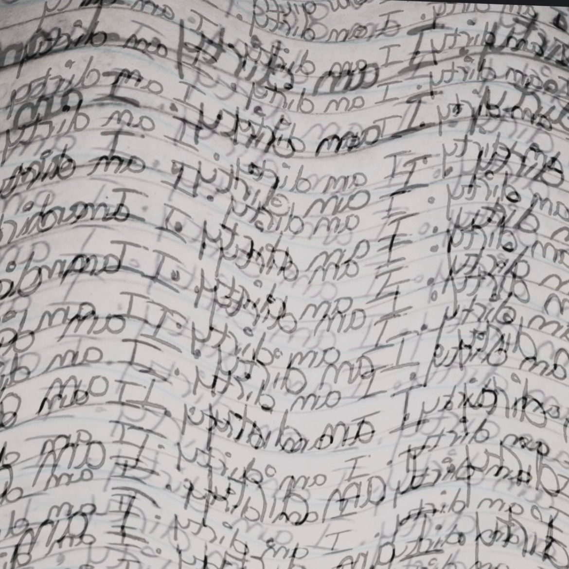 Handwritten text reading: “I am dirty” but flipped so it reads backwards. This is day one’s entry … but in reverse. I am in recovery from OCD & this ‘phrase writing’ is a part of the process.