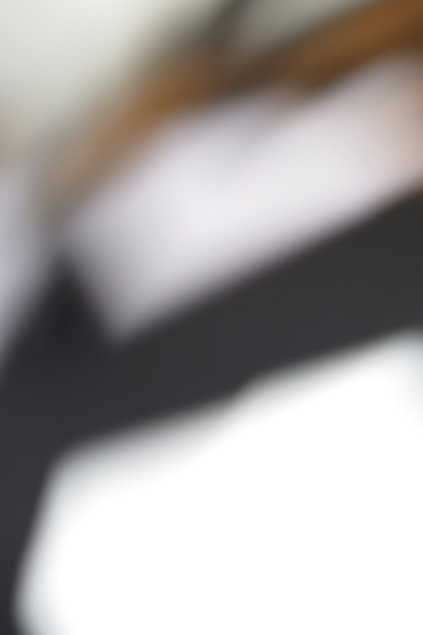 an accidental photograph taken whilst taking other photographs using lights to create a high contrast between the object and the background