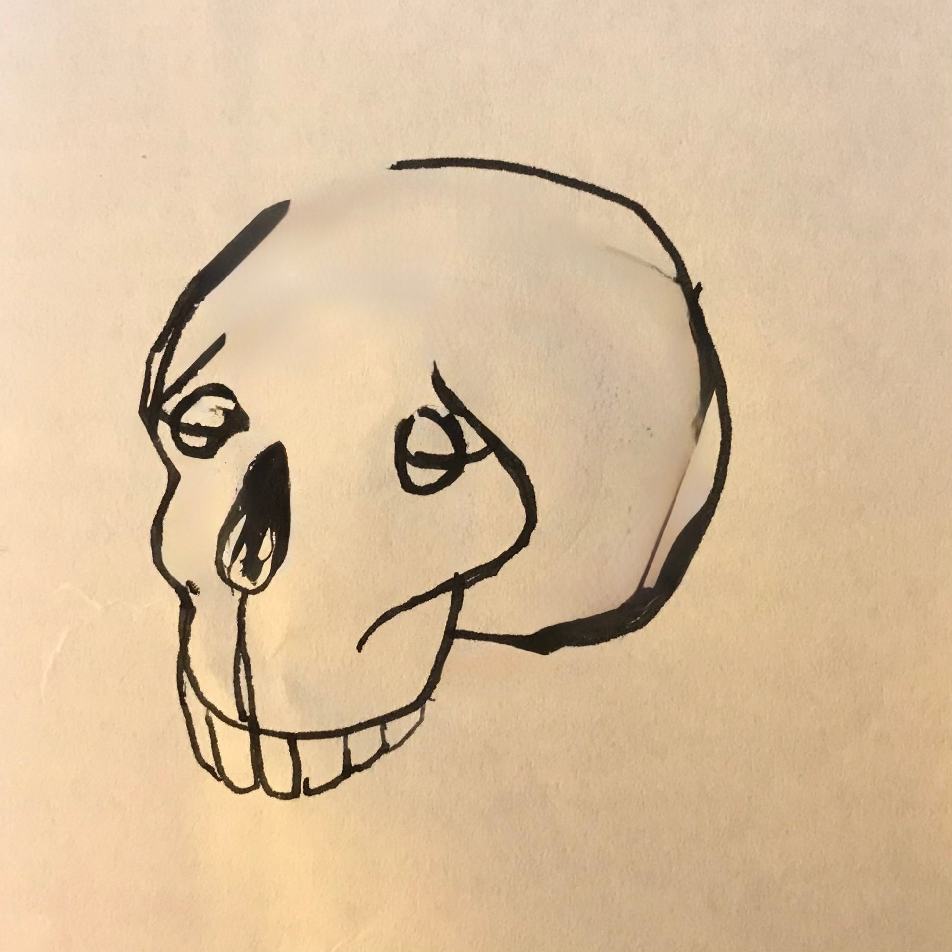 An un-constructive day results in a pen drawing of a sleepy human skull.
