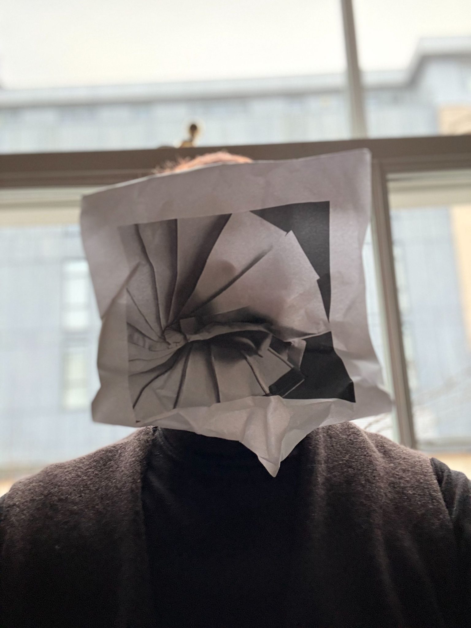 Image from a project I mentored, collaboration between dance and fashion students from LASALLE College of the Arts Singapore, ‘origami project’. The performative works immersed with an exhibition ‘Minimalism: Space.Light.Object’ 2019 at ArtScience Museum SG. The event called ‘Enfold’ https://www.facebook.com/events/artscience-museum/enfold/243152586597702/?locale=zh_CN Here revisited, taking a face lift, as a mask, worn, folded over my face.