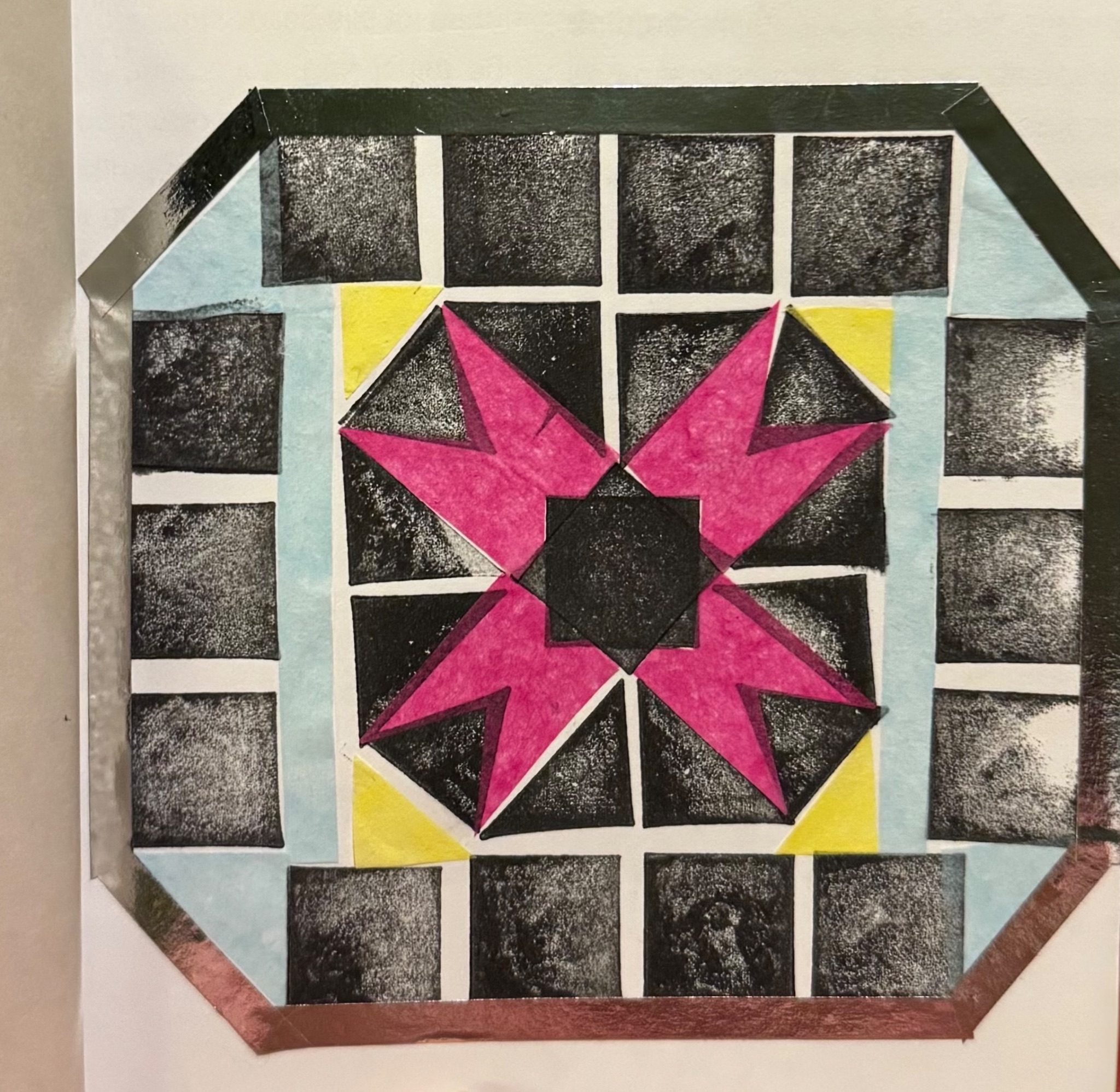 Black and white pattern with coloured tissue paper with a tape border.