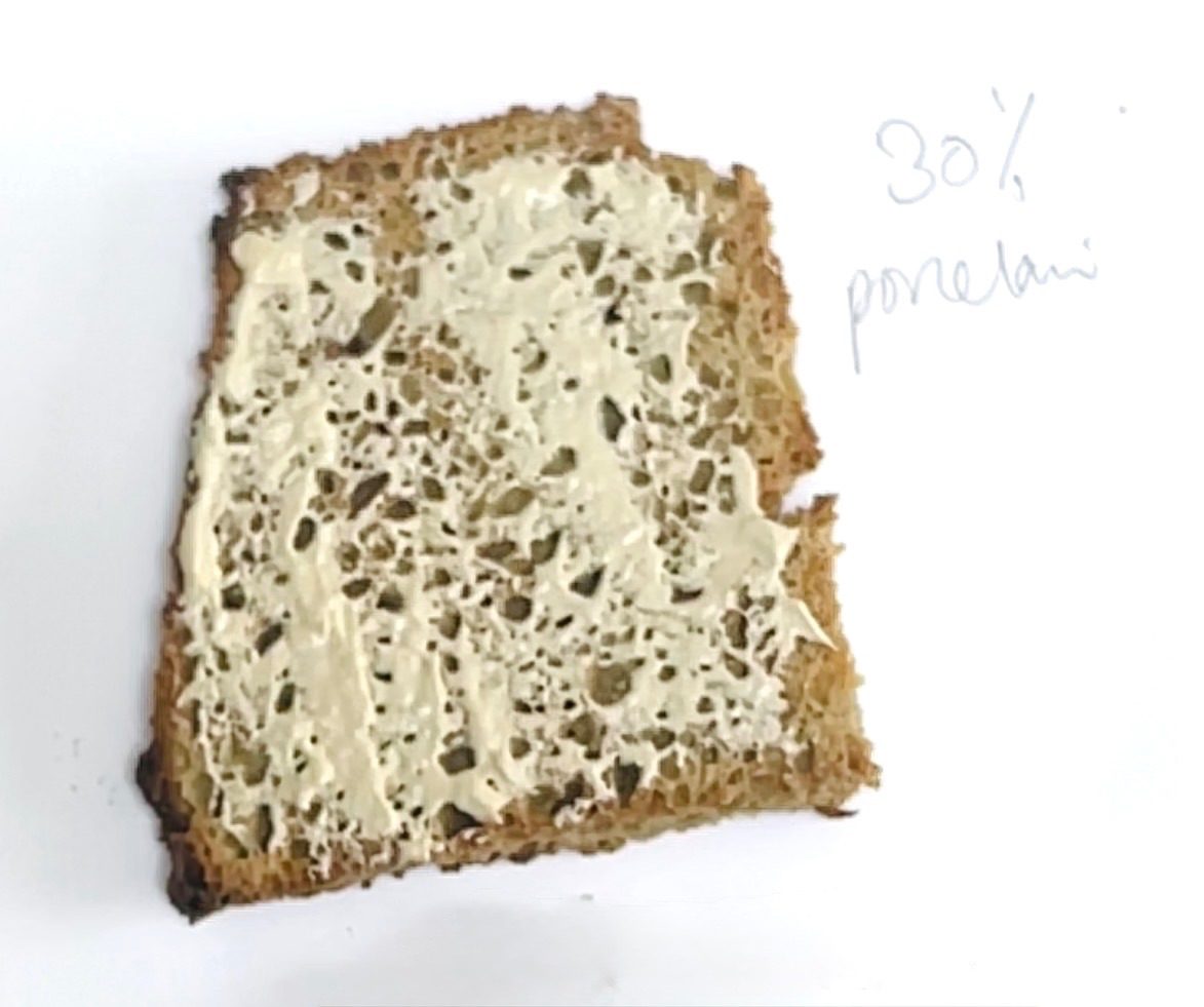 Toasted a slice of clay bread made with porcelain and then spread some porcelain slip on yop