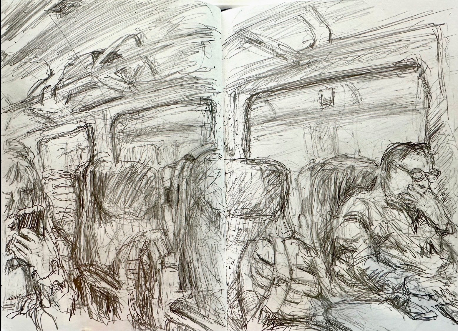 Pencil drawing of interior of train as seen from backward-facing seat