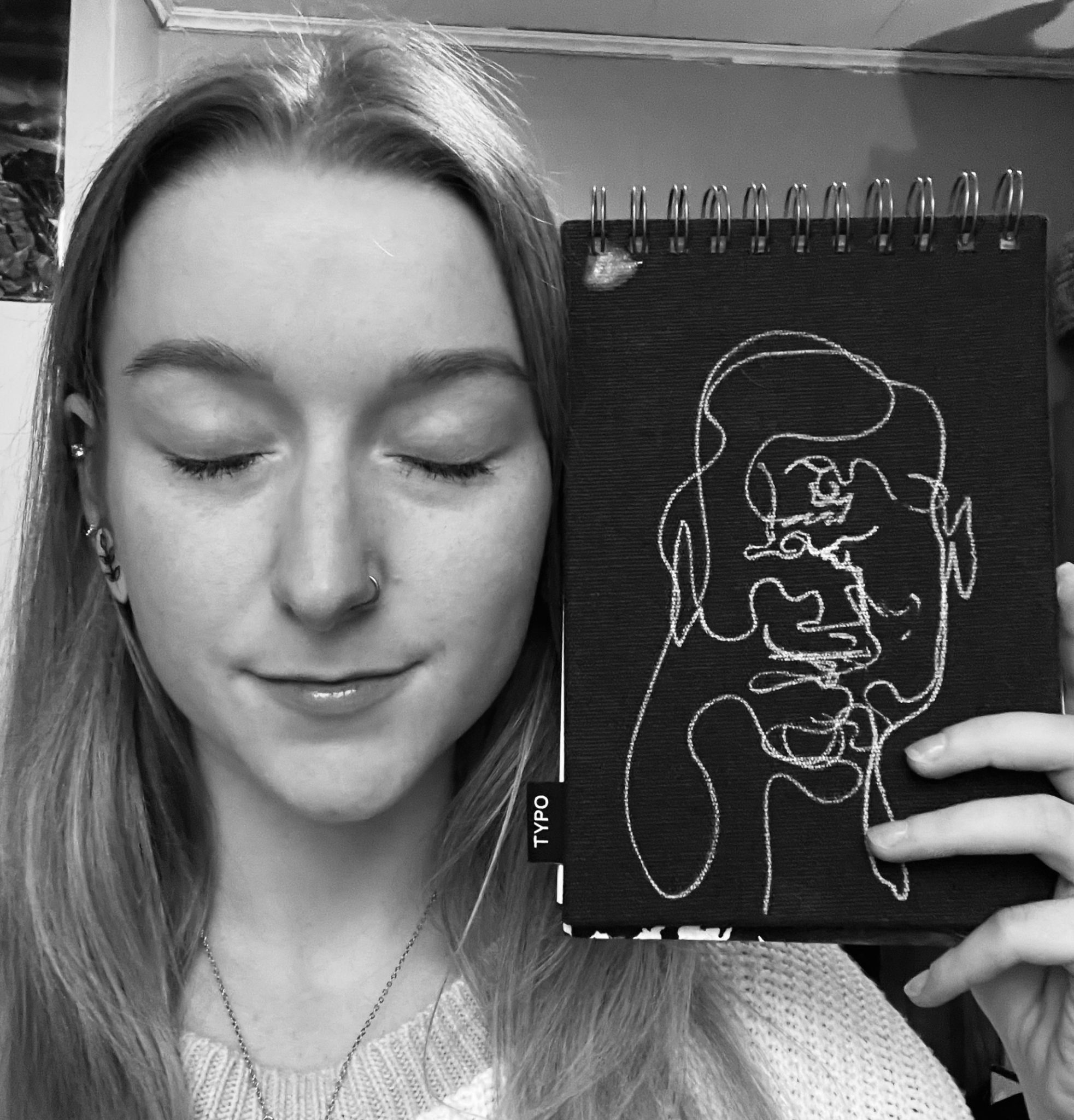 Continuous line blind self portrait