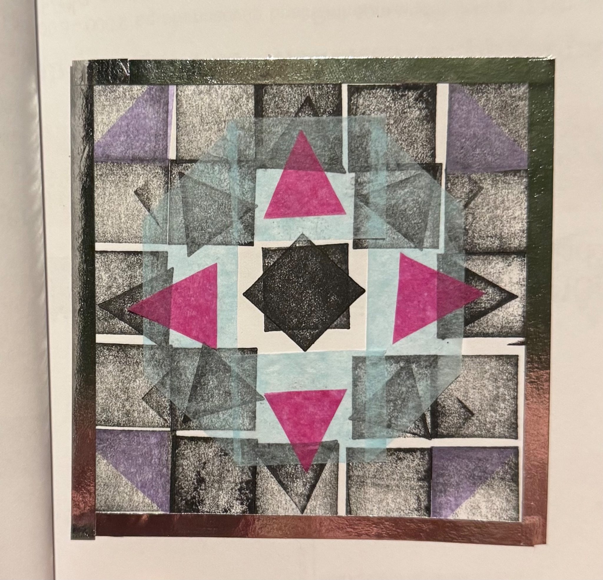 Black and white pattern with tissue paper in different colours in a taped square.