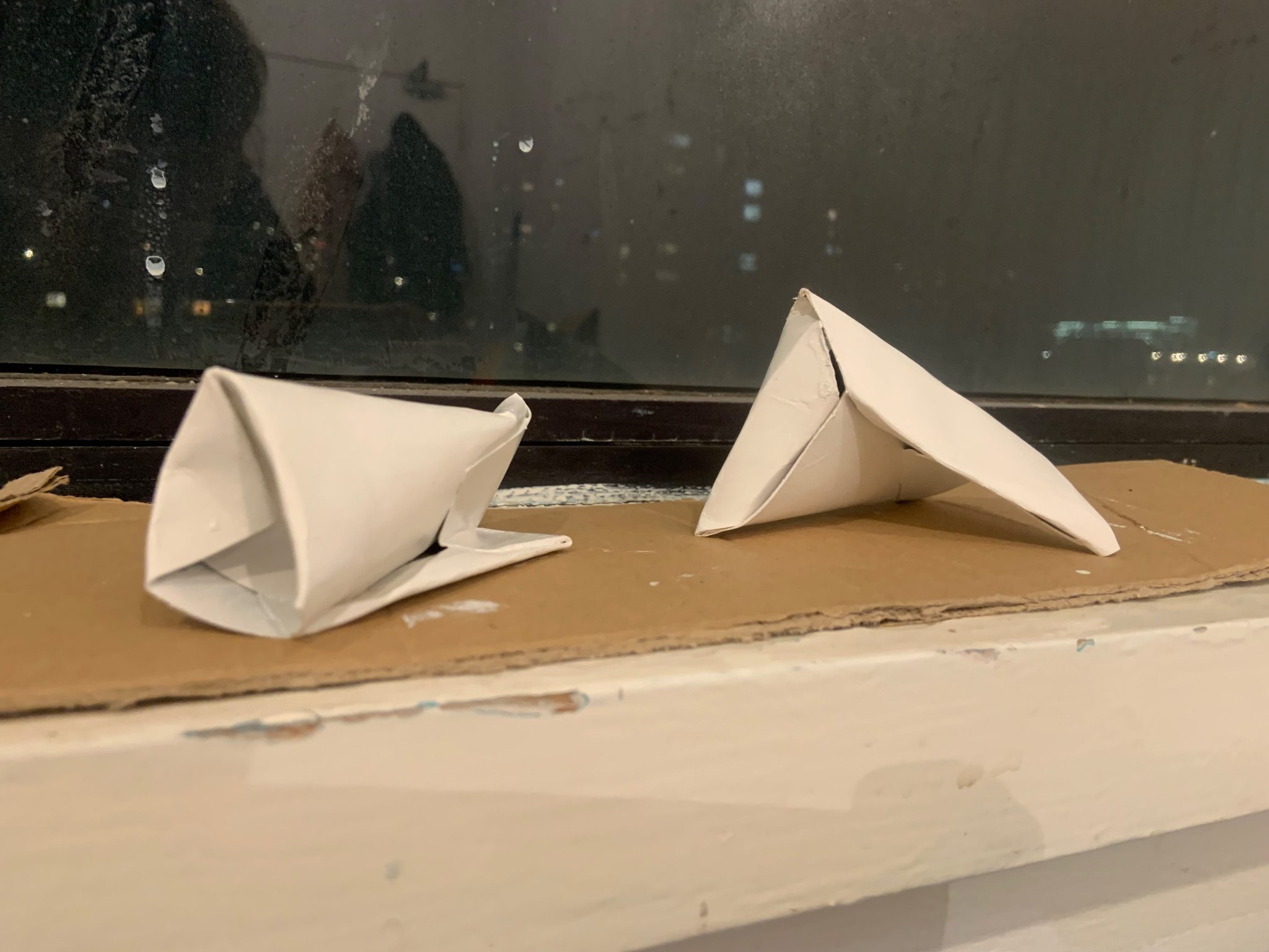 Two small white sculptures