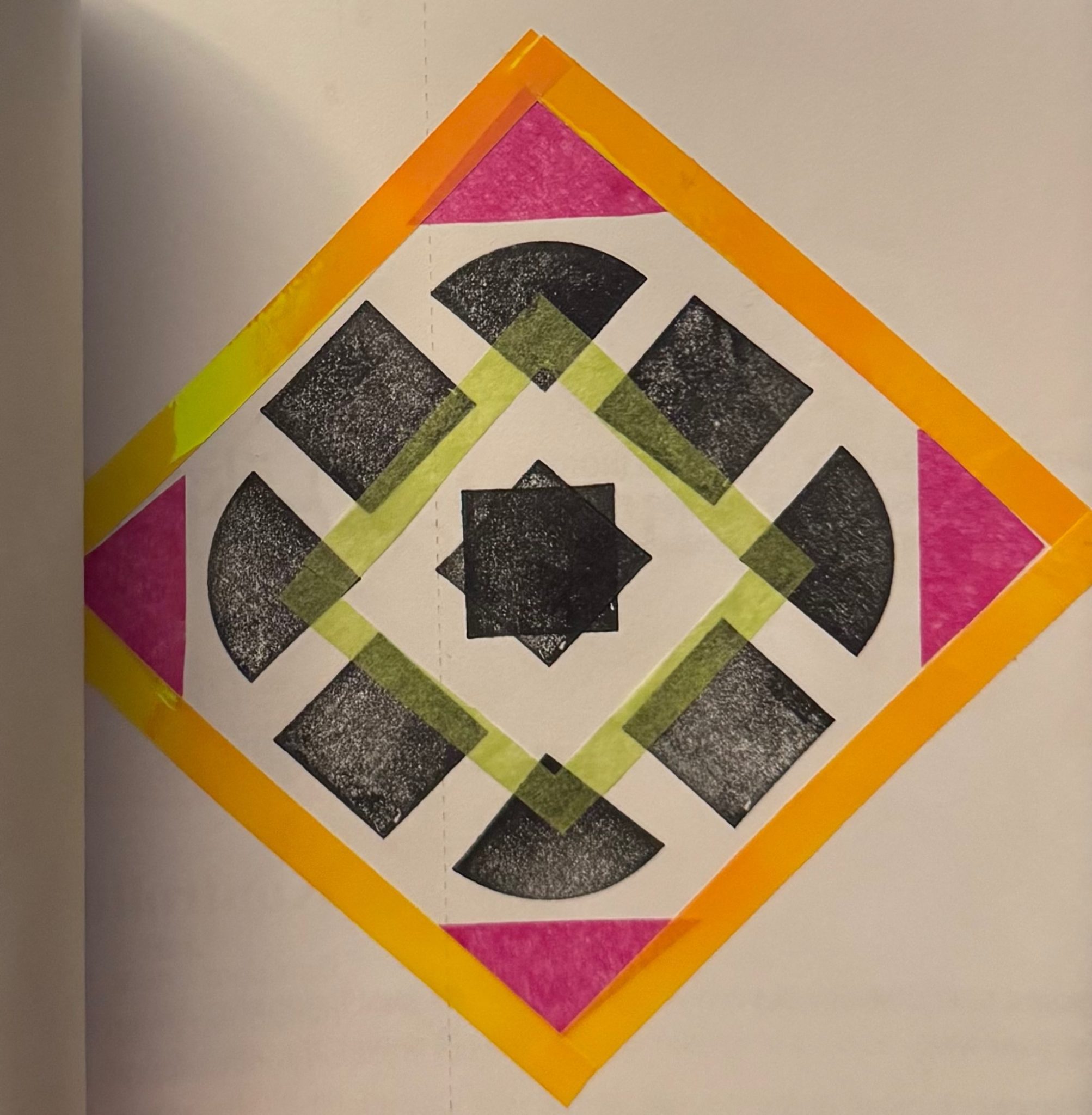 Black and white pattern with coloured tissue paper with a tape frame.