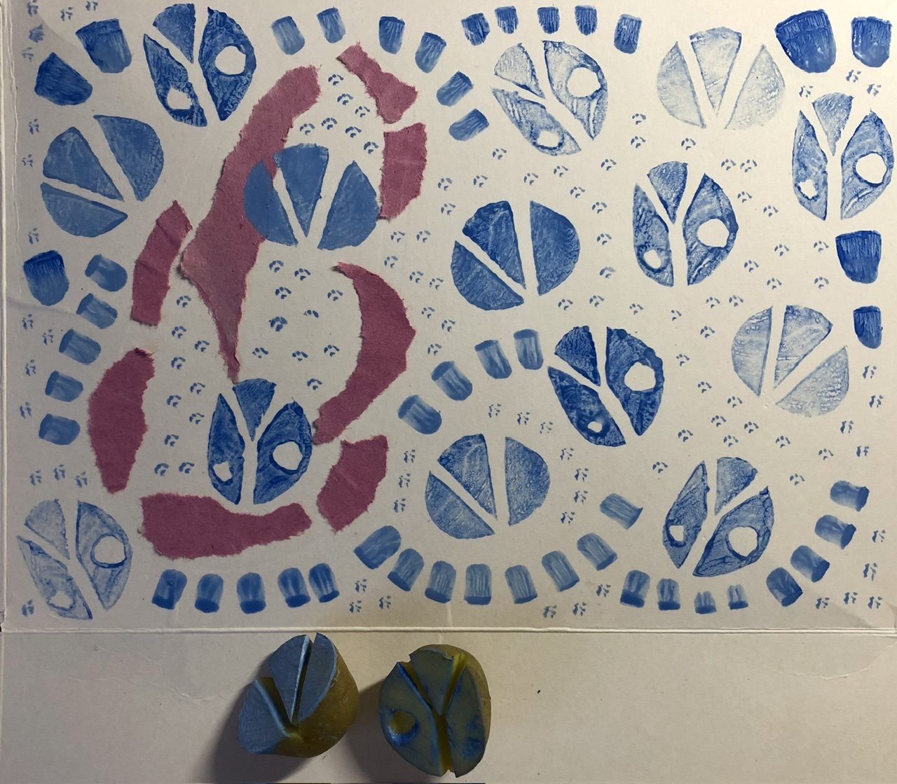 Potato with a V and Y cut printed in blue with a patter inspired by drizzle