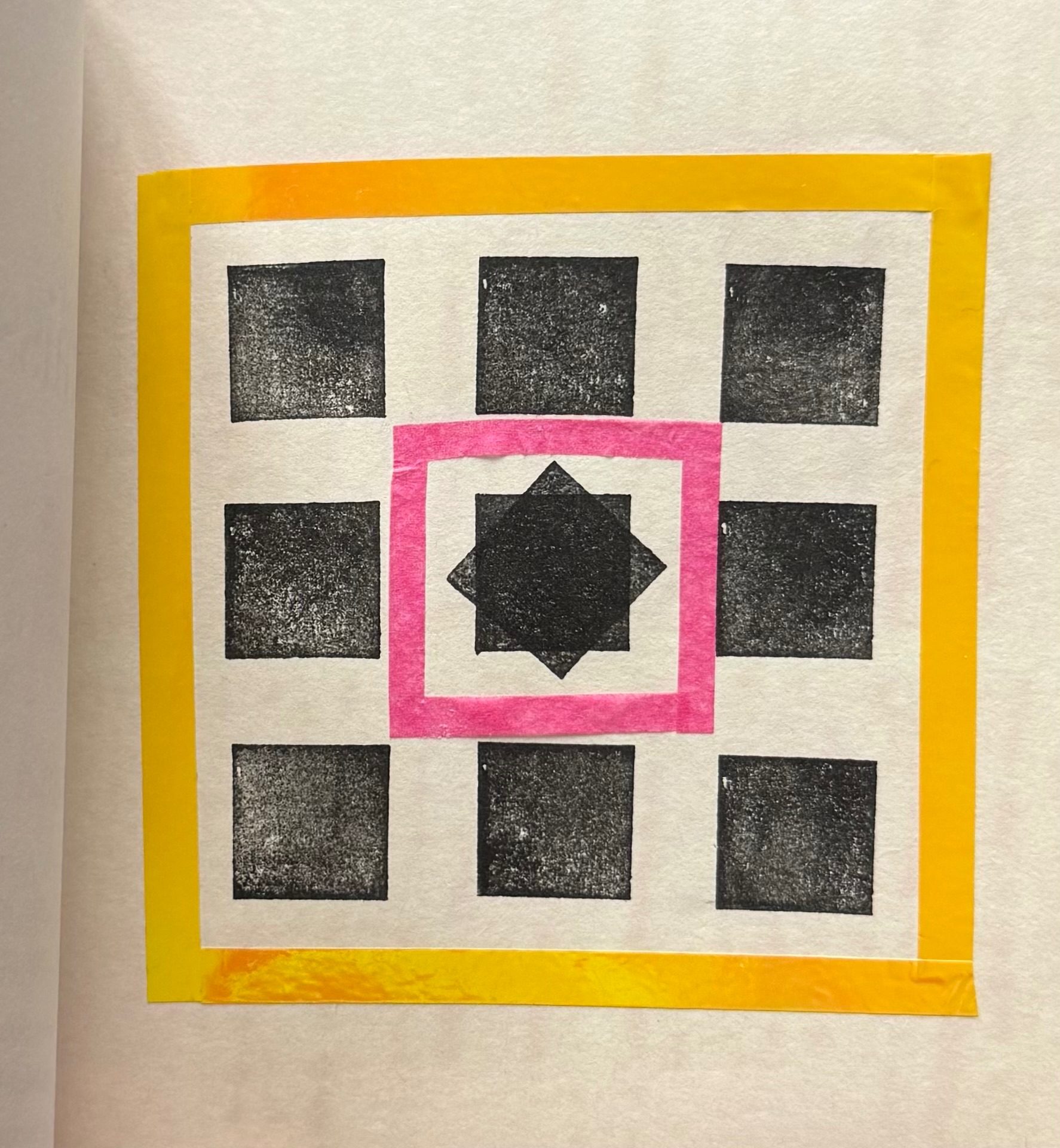 Black and white pattern with shapes with coloured tissue paper and coloured tape.