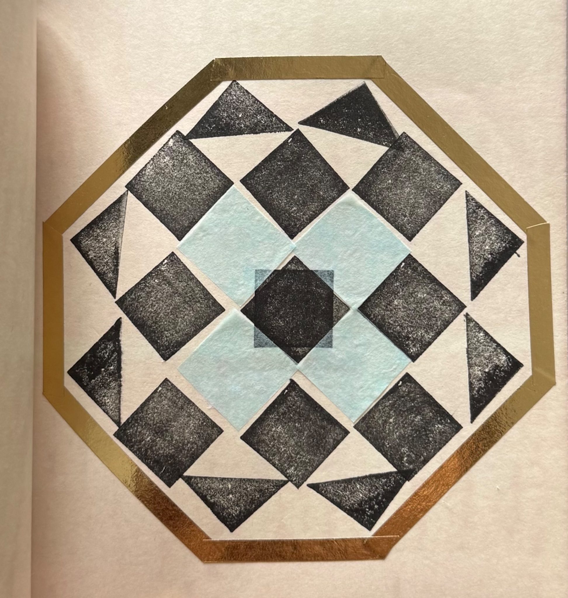 Black and white pattern with tissue paper and gold tape outline.