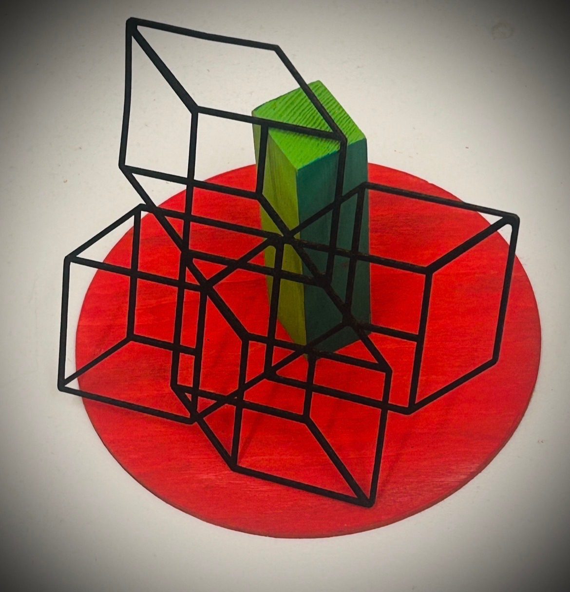 Mixed media sculpture with cut card, wood and paint