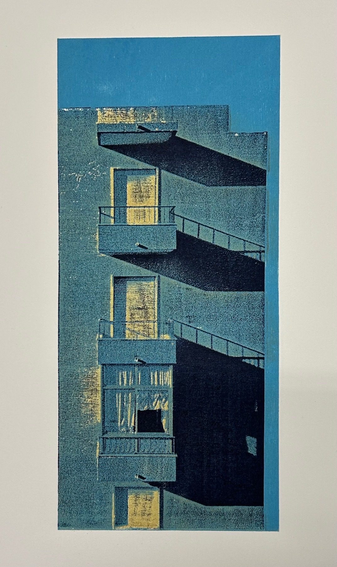 Woodblock print of an apartment building