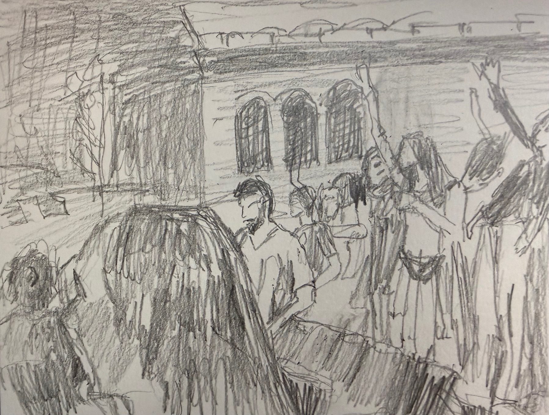 Pencil drawing in my sketchbook of people at the Brixton academy