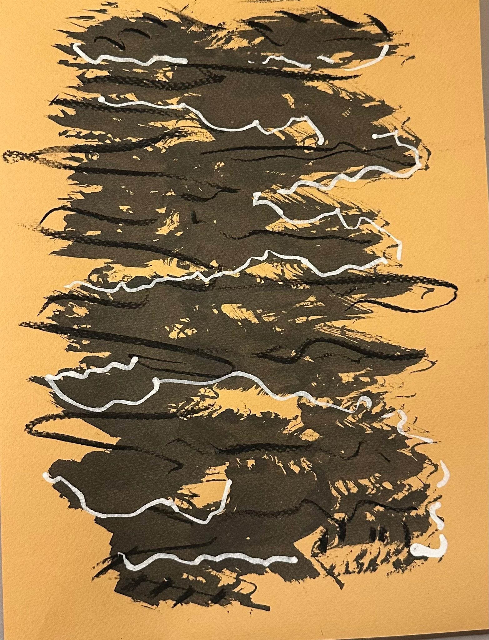 Abstract gestural work in black ink, charcoal and white posca pen on a peach background