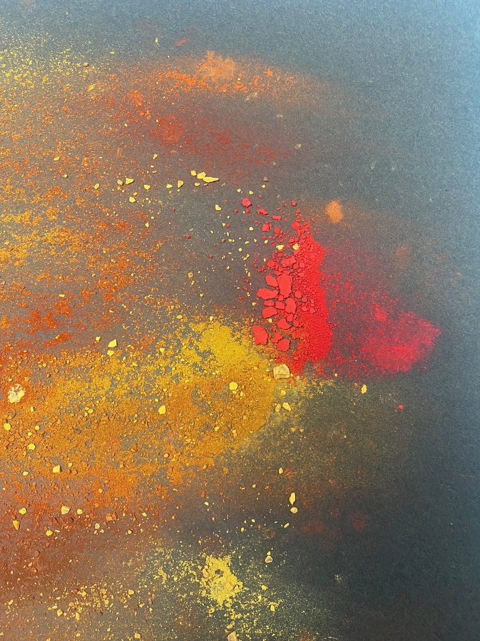 Broken oil pastels on paper