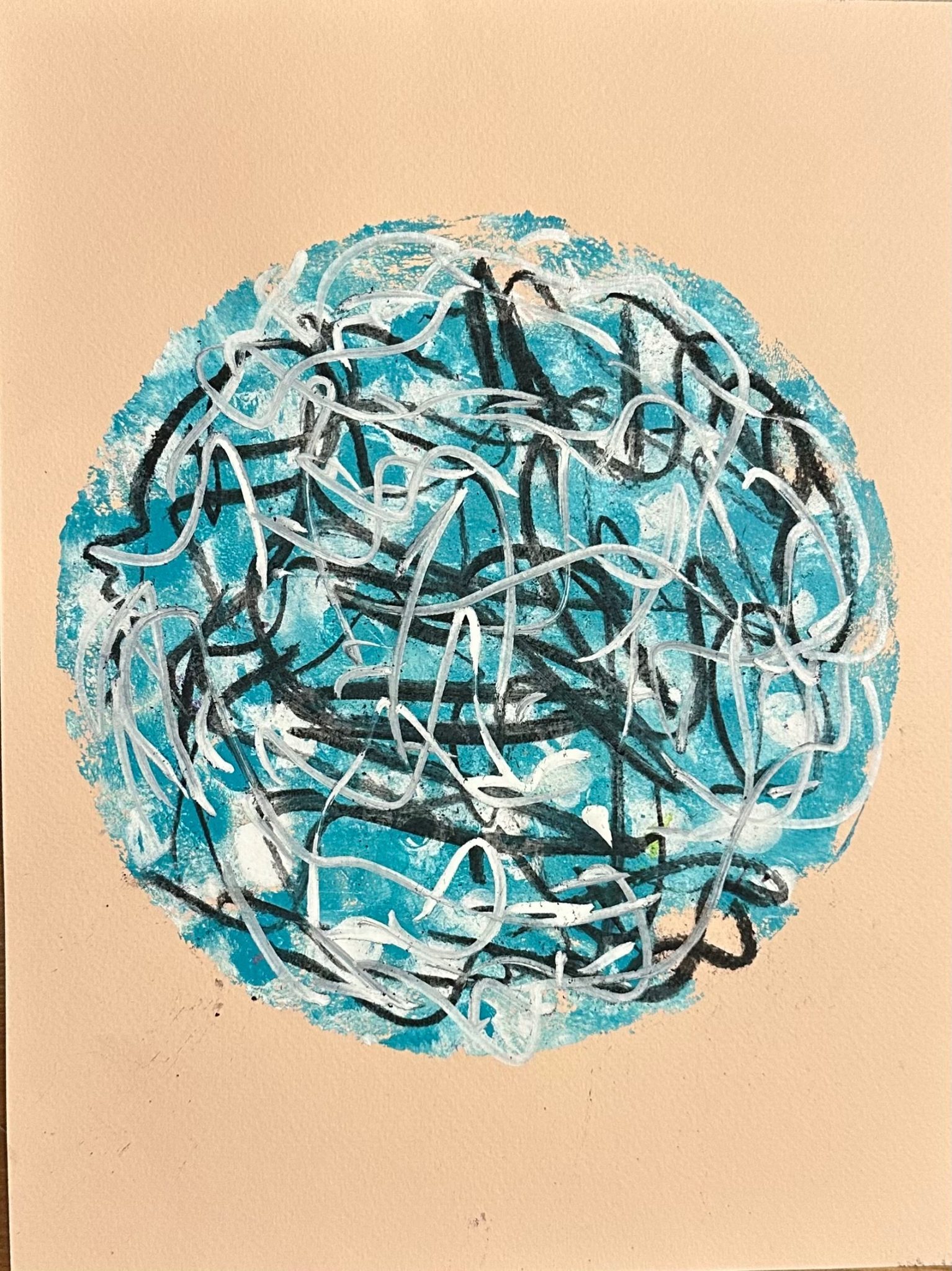 A round shaped blue print reworked in white acrylic and charcoal scribbles