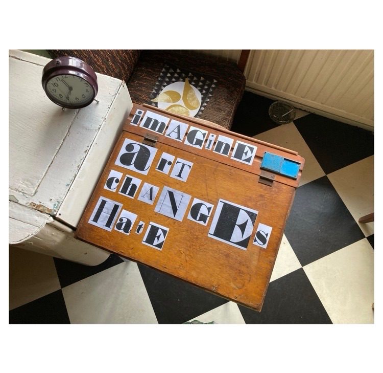 Cut out letters on a wooden desk