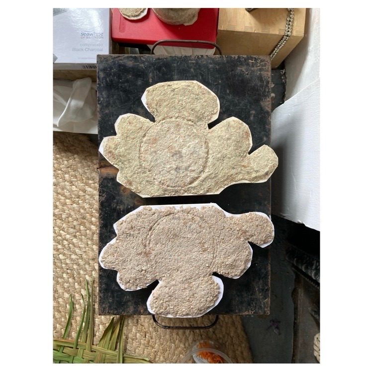 Papier-mache sculpture 2 shapes mirror each other