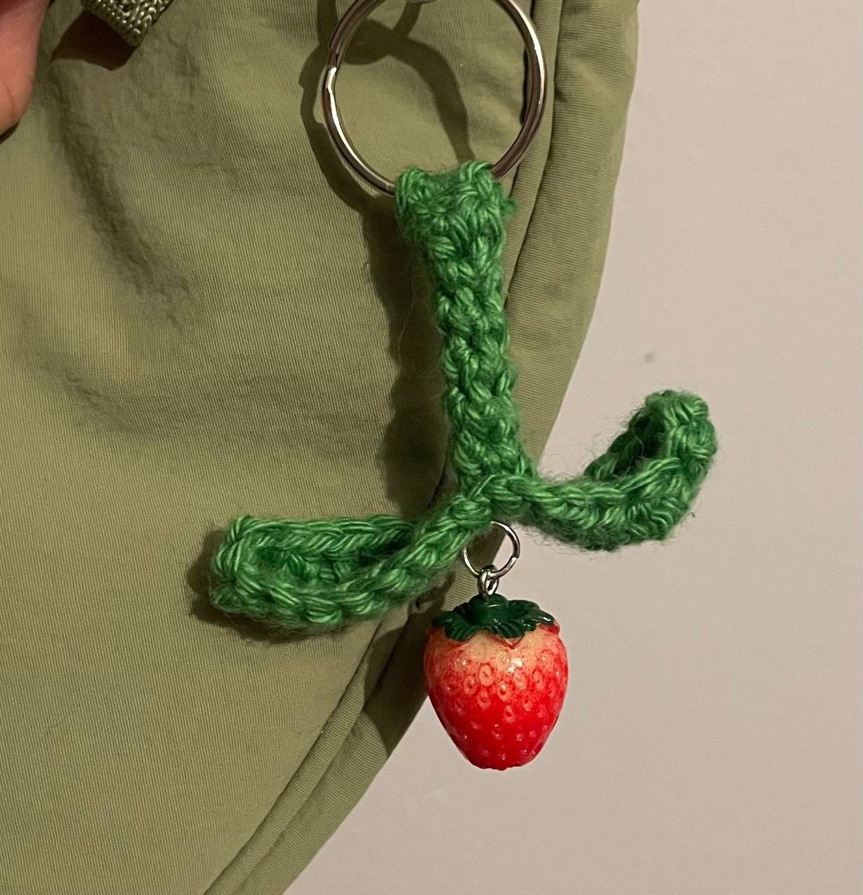 Crocheted sprout keyring with strawberry charm