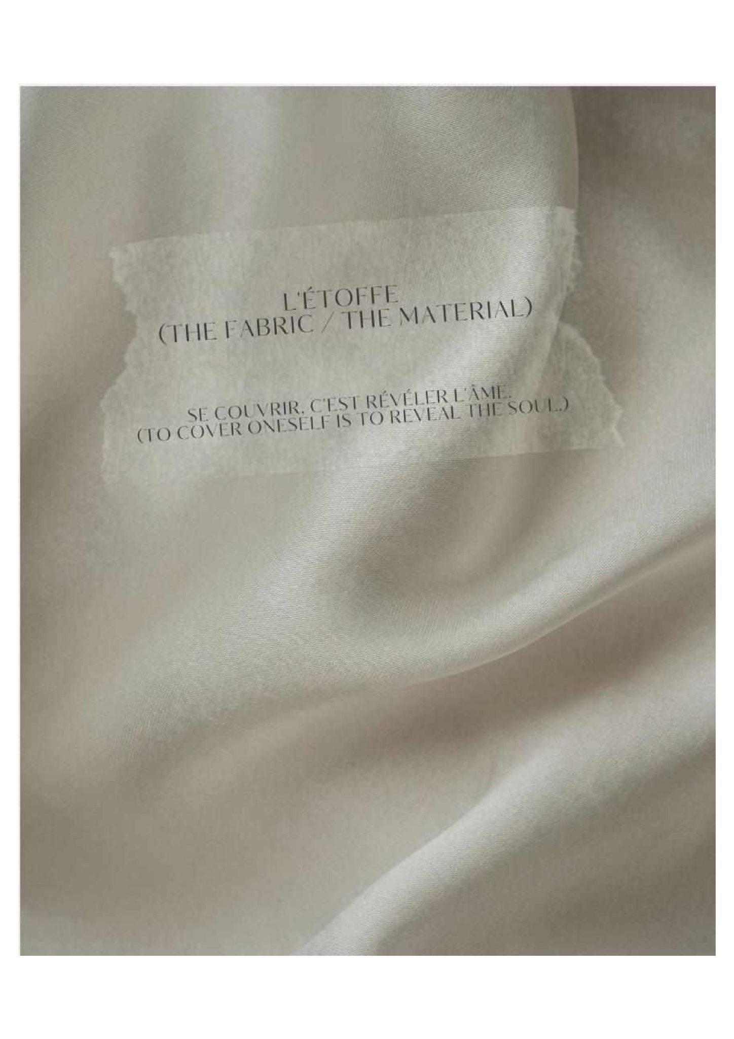 A close-up photograph displays the lustrous, soft folds of cream-colored silk fabric. A jagged strip of translucent tape overlays the texture, bearing the bilingual title 