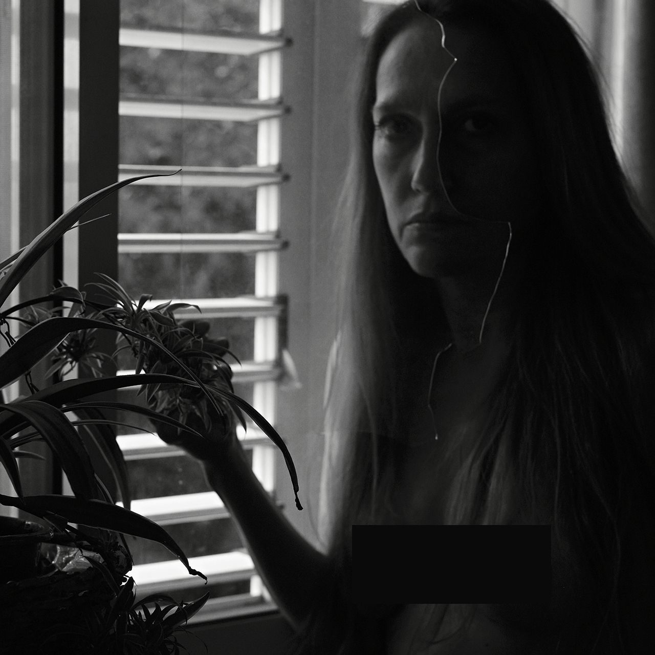 self-portrait  with a glass